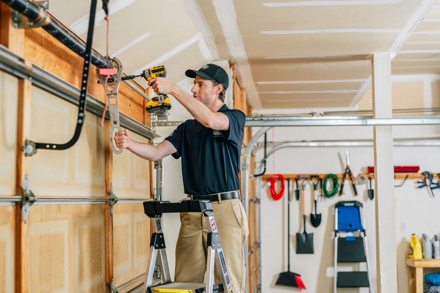 Customer buying a new garage door from Precision Garage Door