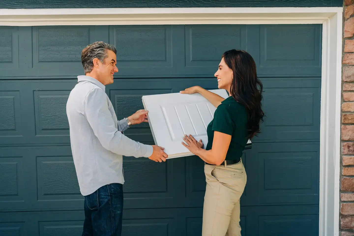 Customer buying a new garage door from Precision Garage Door