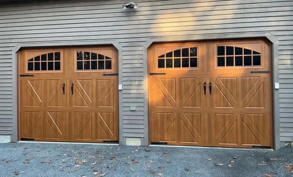 Double carriage house garage doors after a garage door replacement in Portland, ME